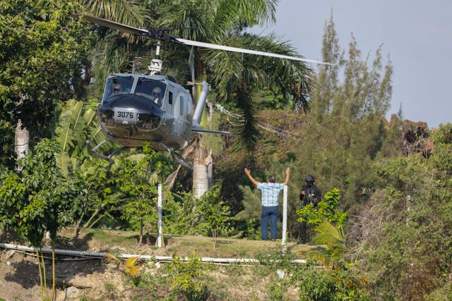 <p>A helicopter lands to evacuate personnel at the Dominican embassy in Port-au-Prince, Haiti, Thursday, March 21, 2024.</p>