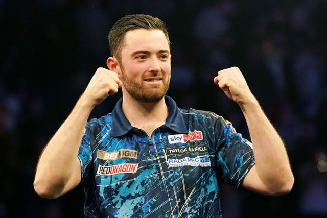 Luke Humphries celebrates victory over Nathan Aspinall on night seven of the 2024 BetMGM Premier League at the Motorpoint Arena, Nottingham. Picture date: Thursday March 14, 2024.