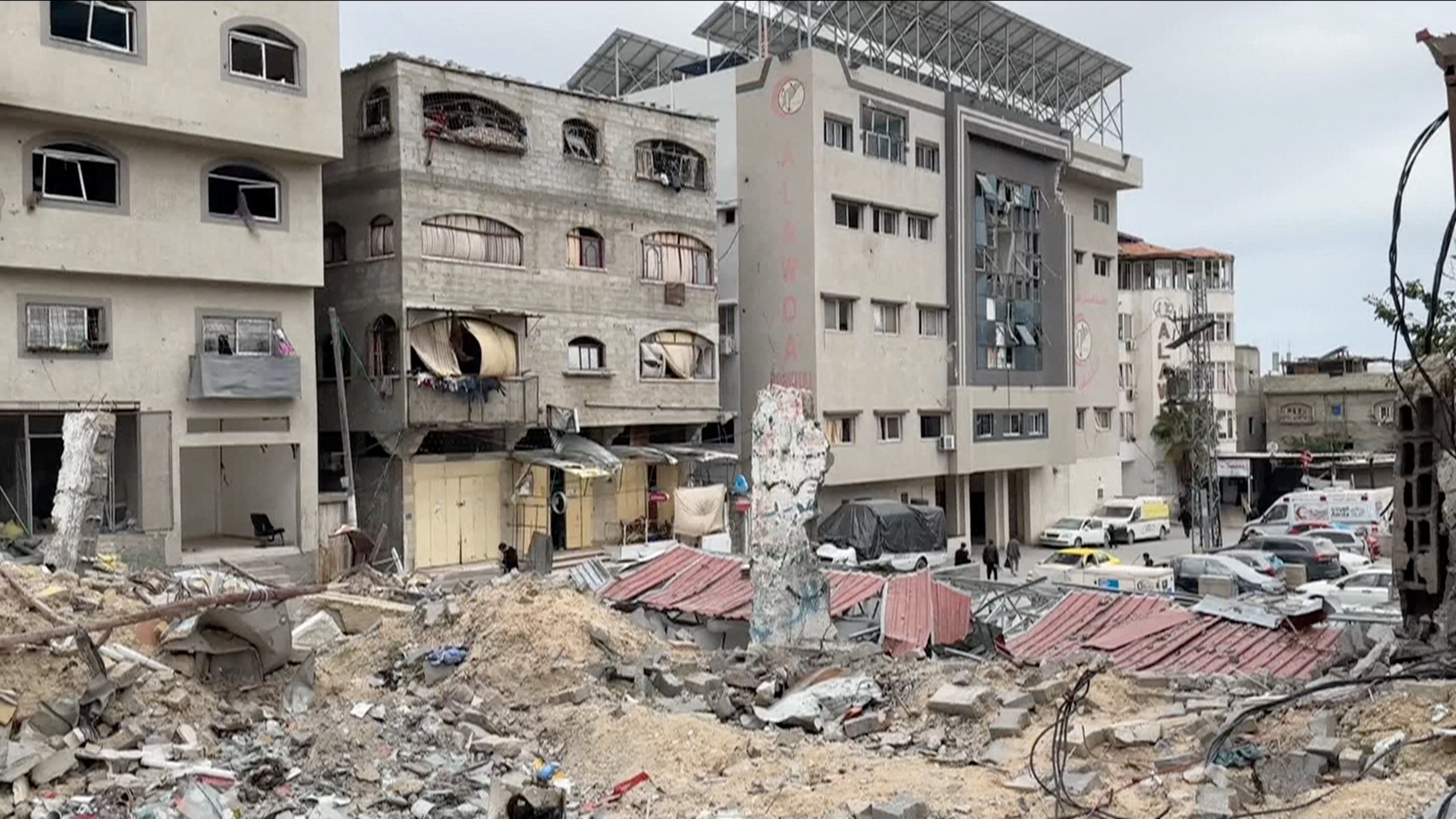 A view of damage to the facade of Al-Awda Hospital, amid the ongoing conflict between Israel and Hamas, in Gaza, on March 21