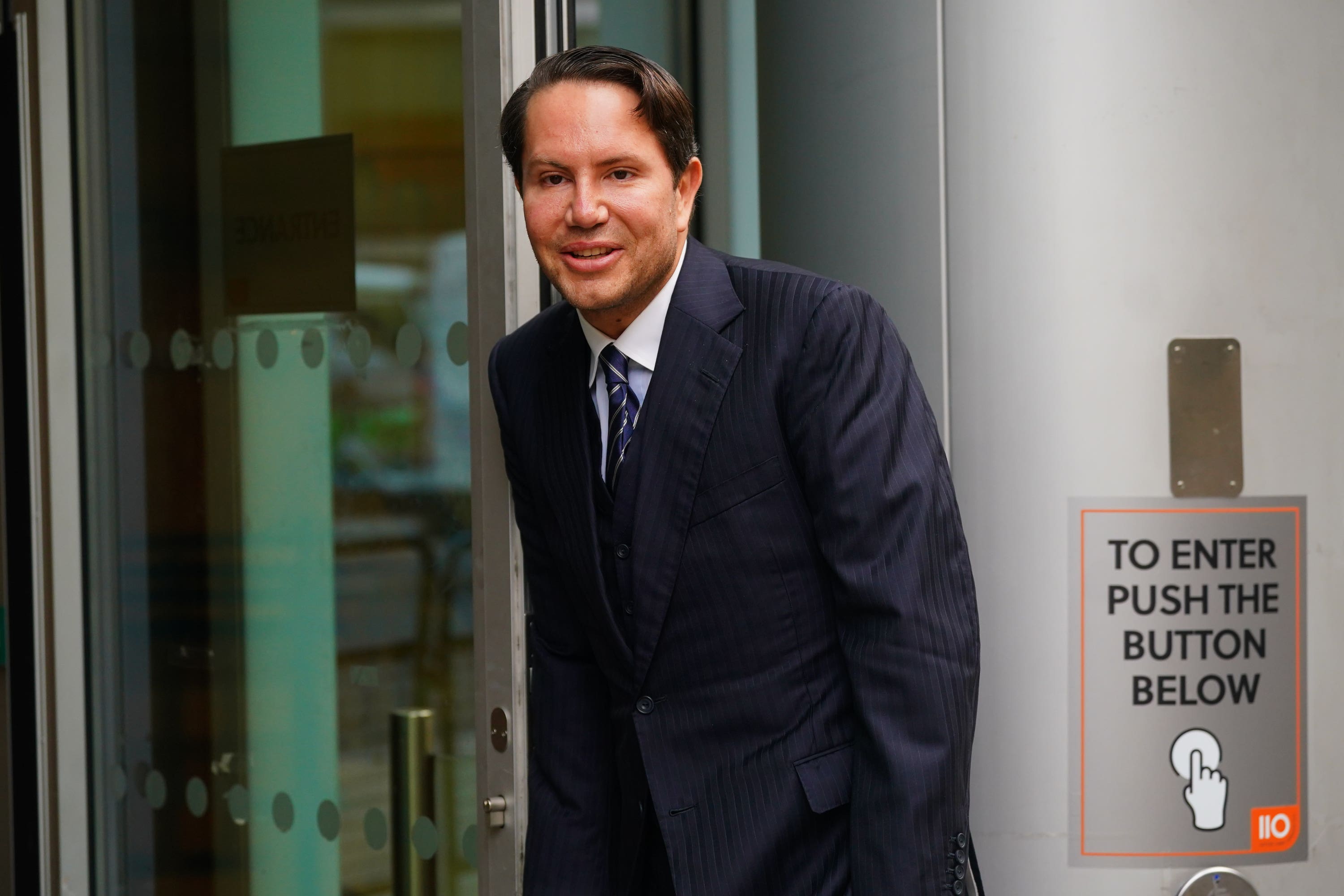 James Stunt arrives at the Rolls Building in London for the trial in March