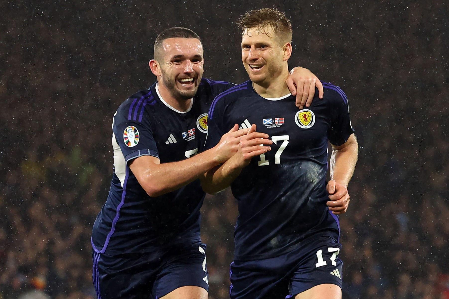 Scotland booked their place in Germany by finishing second in Group A
