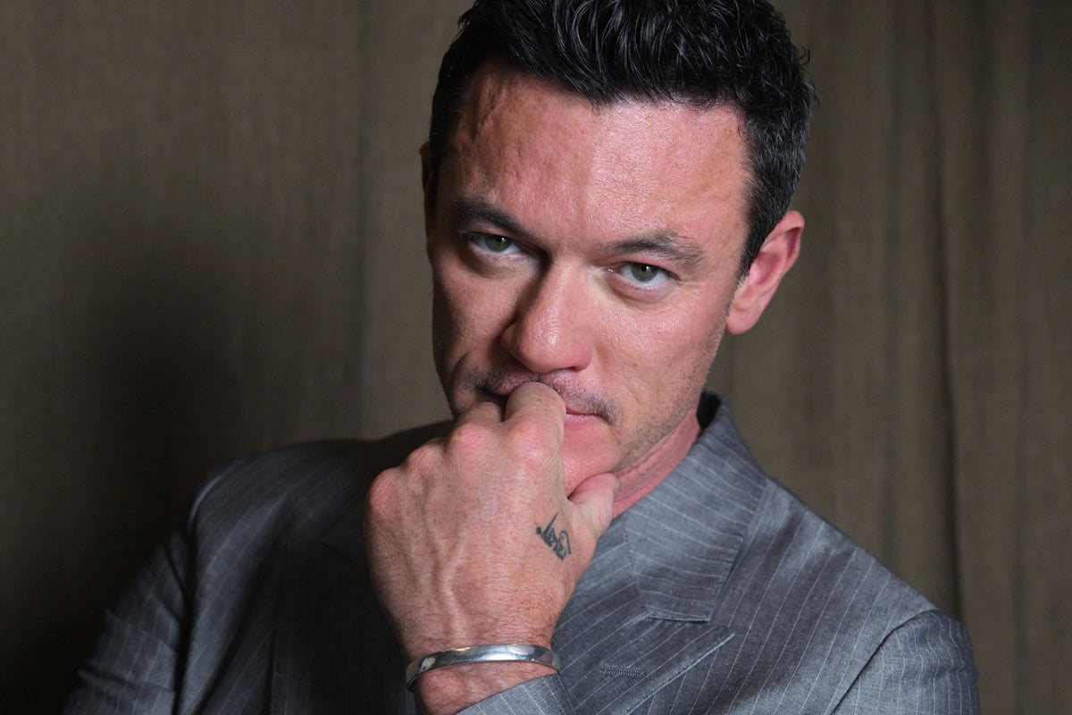 Luke Evans on fashion, marriage and body image: ‘I wasn’t pretty or flawless – I looked like a bloke’