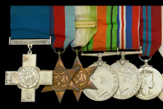 The George Cross, awarded to Sub Lt Easton, is among the seven Second World War medals being put up for auction (Noonans Mayfair/PA)