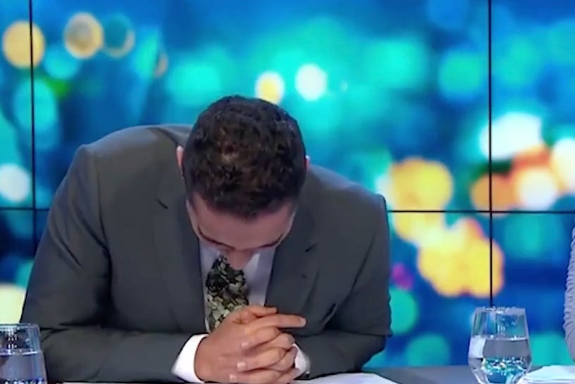 Waleed Aly then held his head down toward the desk after Margolyes asked him, ‘What are you? Sort of brown?’