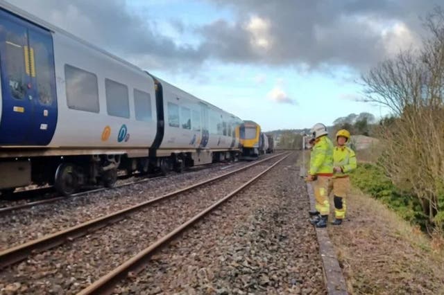 <p>Eight people were on board the Northern train when it derailed after driving over a sinkhole beneath the tracks </p>