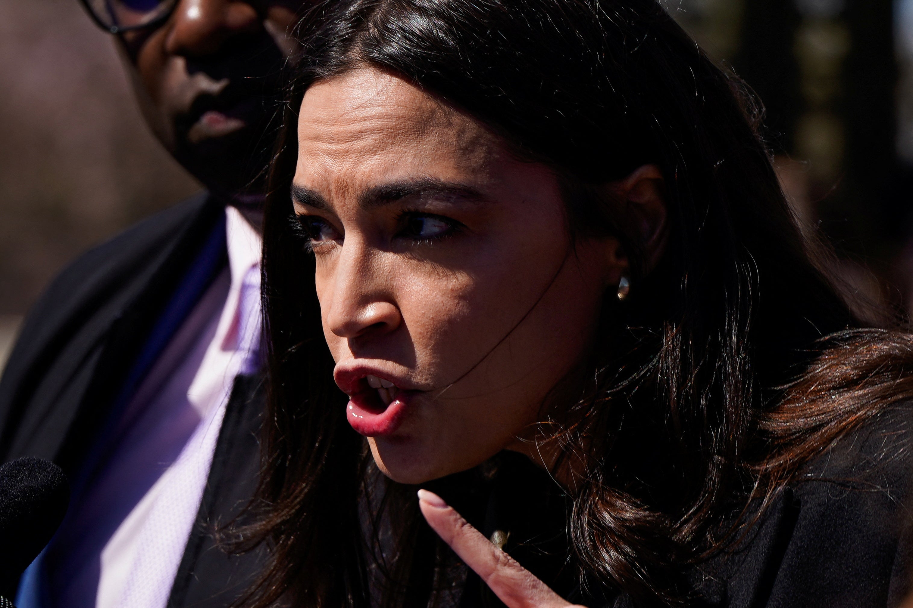 <p>US Rep Alexandria Ocasio-Cortez speaks to reporters in Washington DC on 21 March. </p>