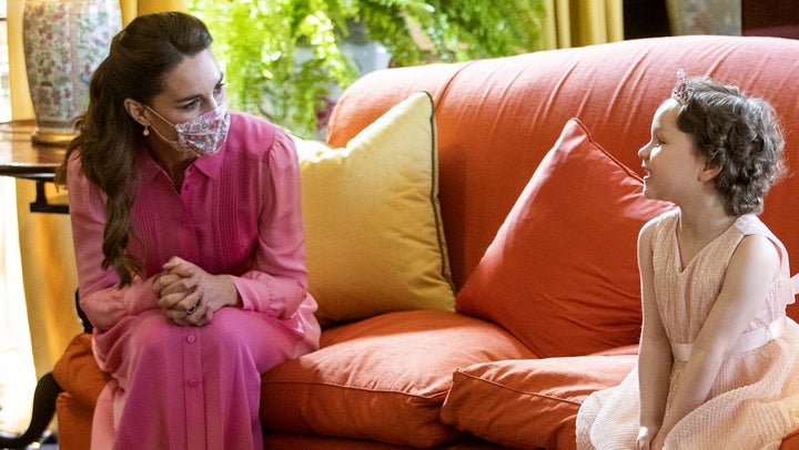 <p>Princess of Wales wears pink to meet young girl diagnosed with cancer in resurfaced clip.</p>