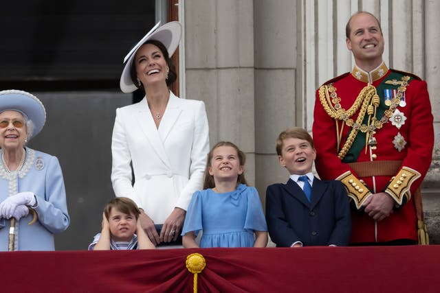 <p>Queen Elizabeth II, Prince Louis, Kate, Duchess of Cambridge, Princess Charlotte, Prince George and Prince William gather on the balcony of Buckingham Palace, London, Thursday, June 2, 2022 as they watch a flypast of Royal Air Force aircraft pass over </p>