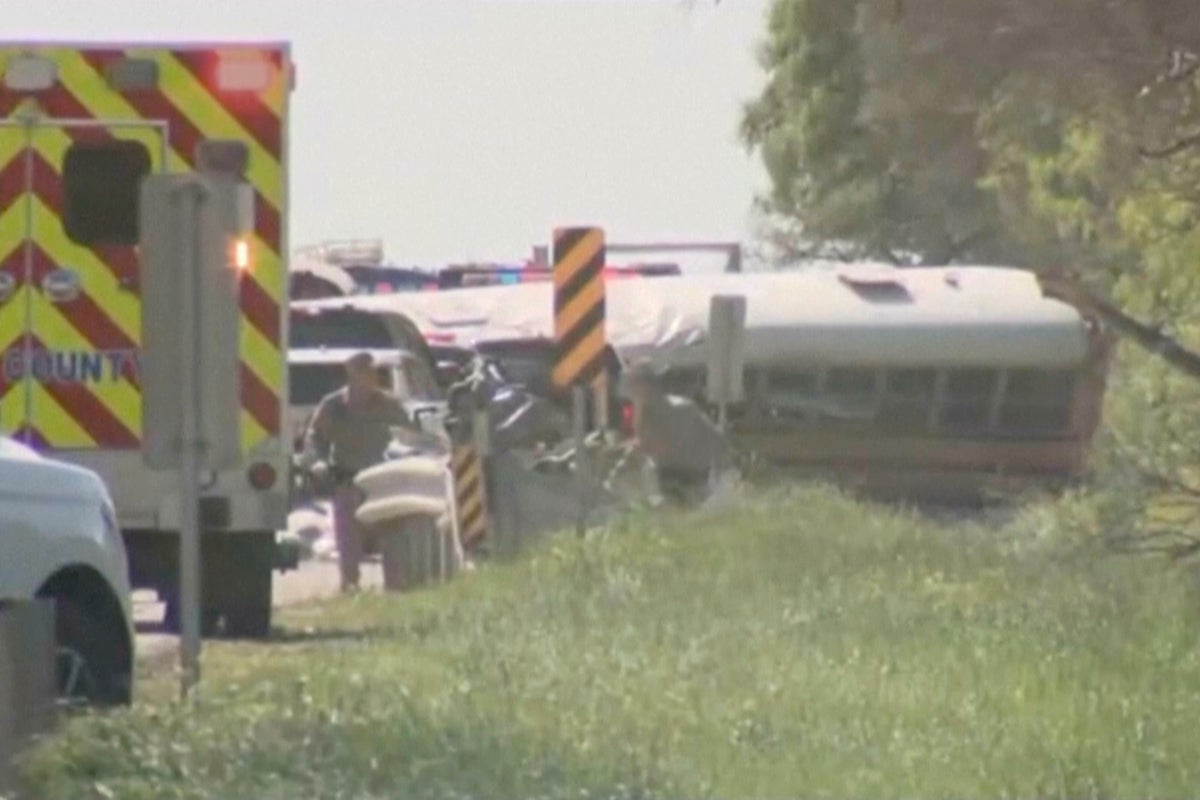 Two killed after Texas school bus carrying 44 pre-kindergarten students collides with concrete truck