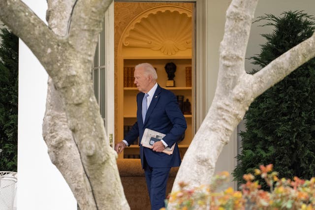 <p>President Joe Biden walks out of the Oval Office to board Marine One on the South Lawn of the White House</p>