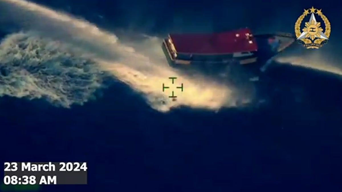 Chinese coast guard fires water cannon at Filipino supply boat in drone footage