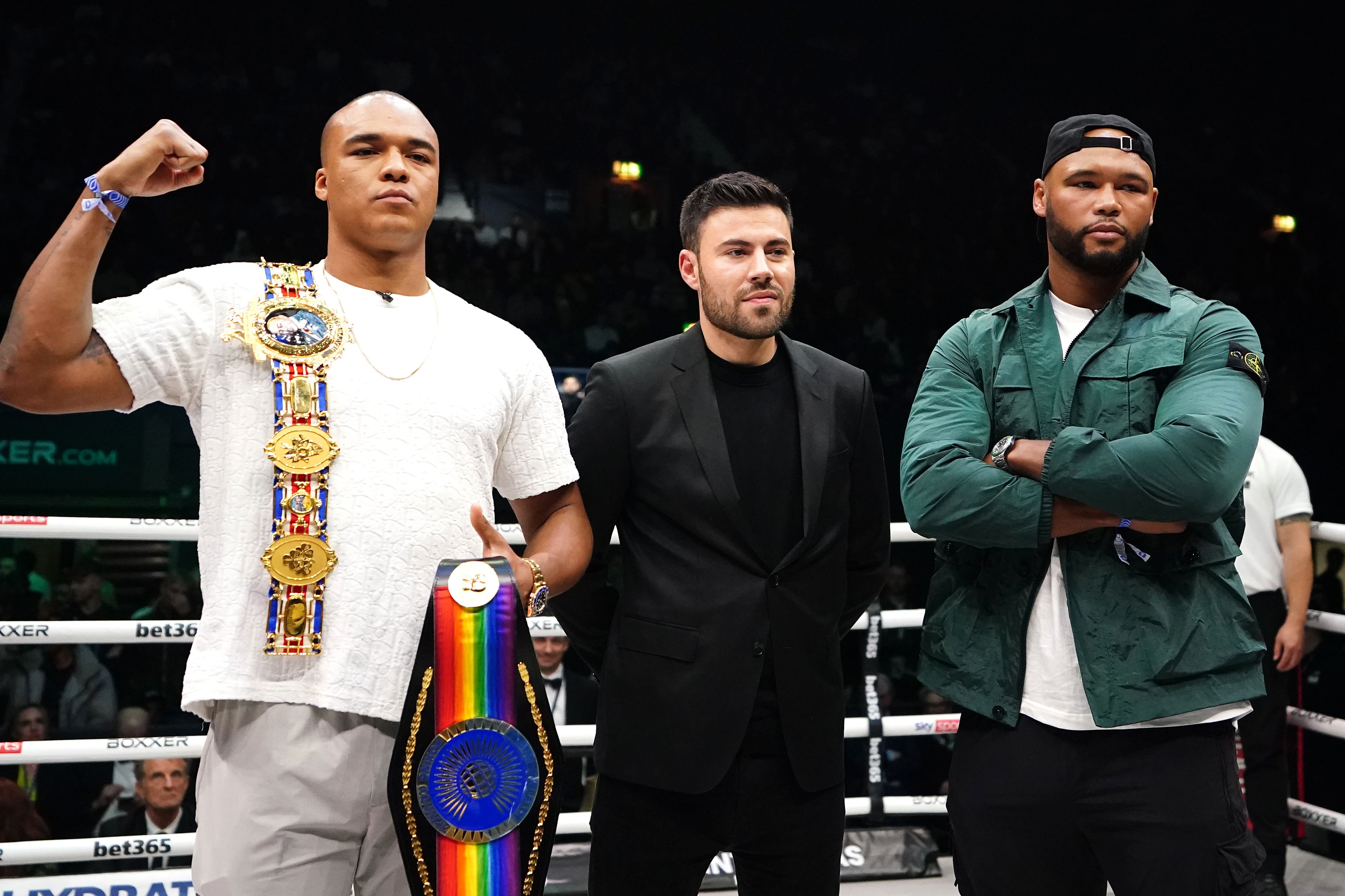 Boxers Fabio Wardley (left) and Frazer Clarke (right) with BOXXER chief executive Ben Shalom (Zac Goodwin/PA)