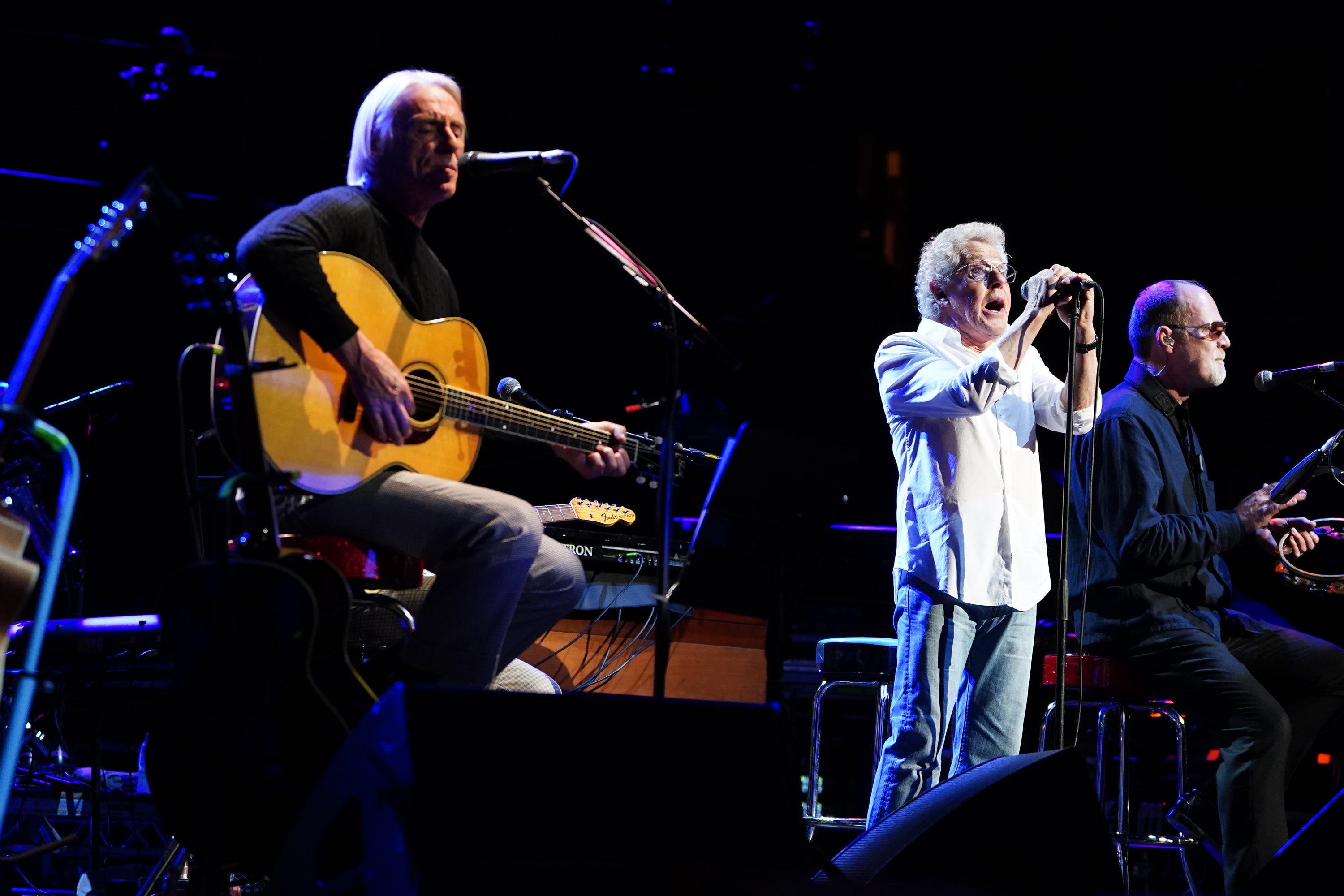 Paul Weller (left) and Roger Daltrey (centre), on stage during Ovation, a celebration of 24 Years of gigs for the Teenage Cancer Trust, at the Royal Albert Hall, London