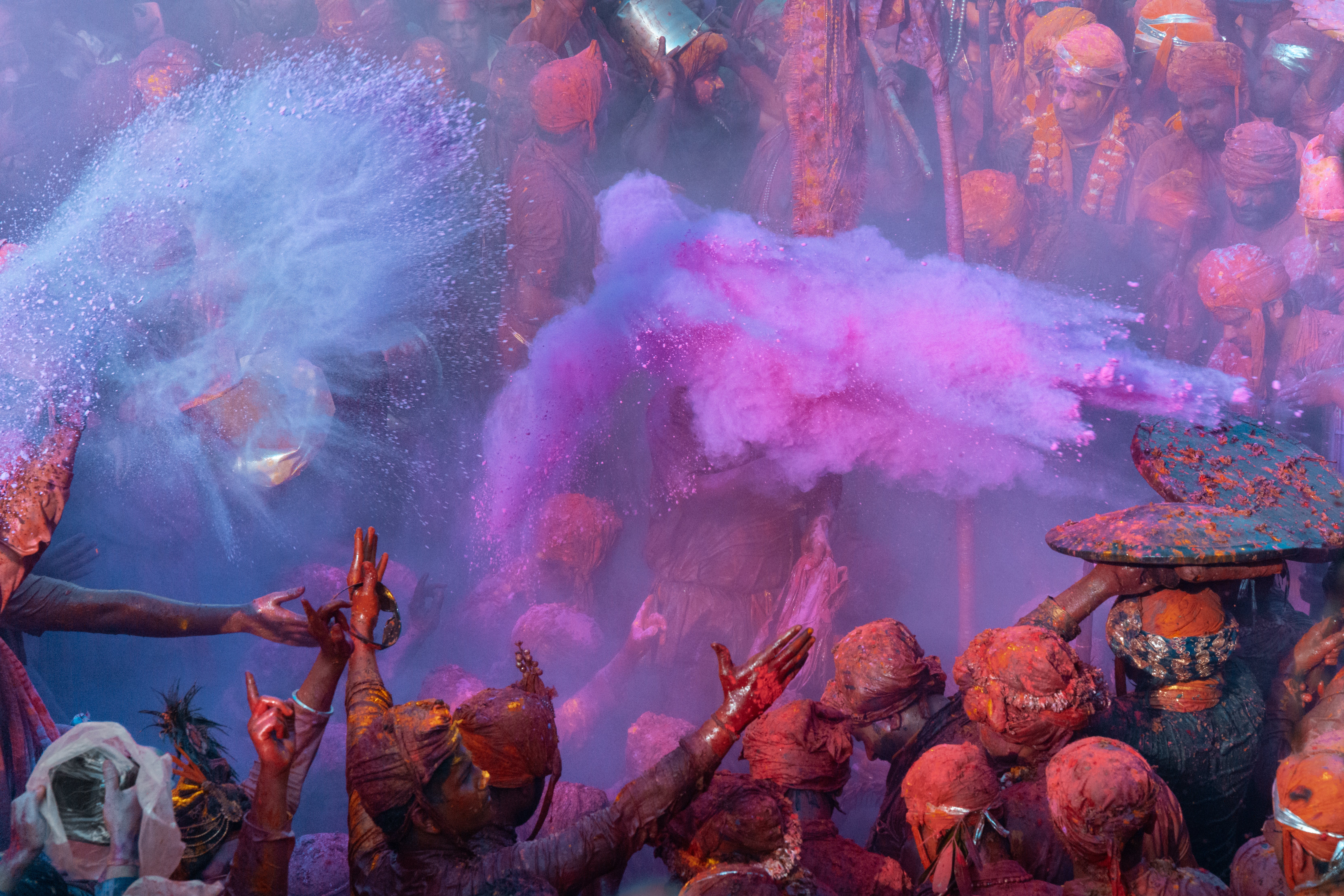 Purple rain: a mist of paint launches into the welcoming crowd