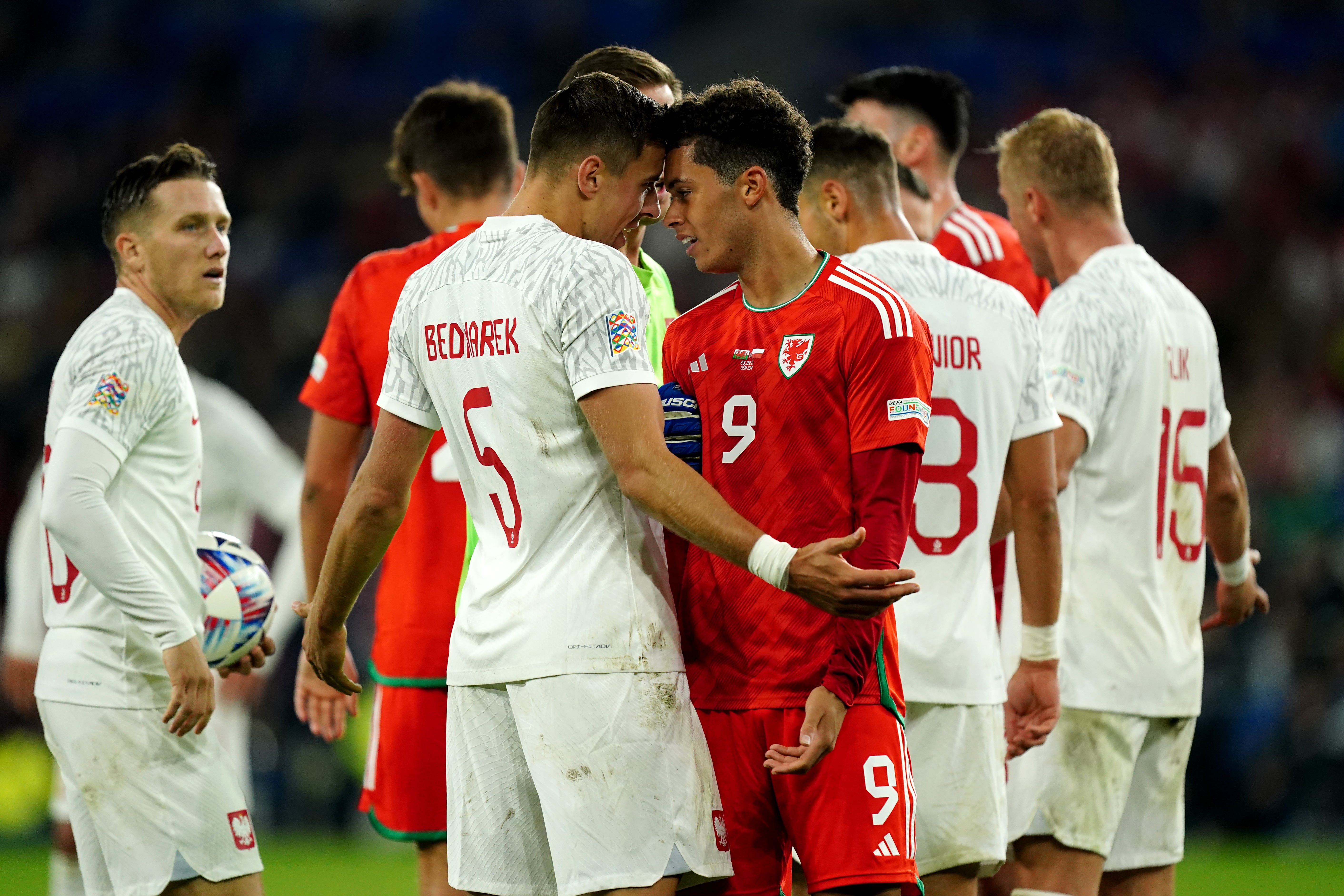 Poland defender Jan Bednarek and Wales striker Brennan Johnson go head to head in a Nations League encounter at Cardiff in September 2022 (Mike Egerton/PA)