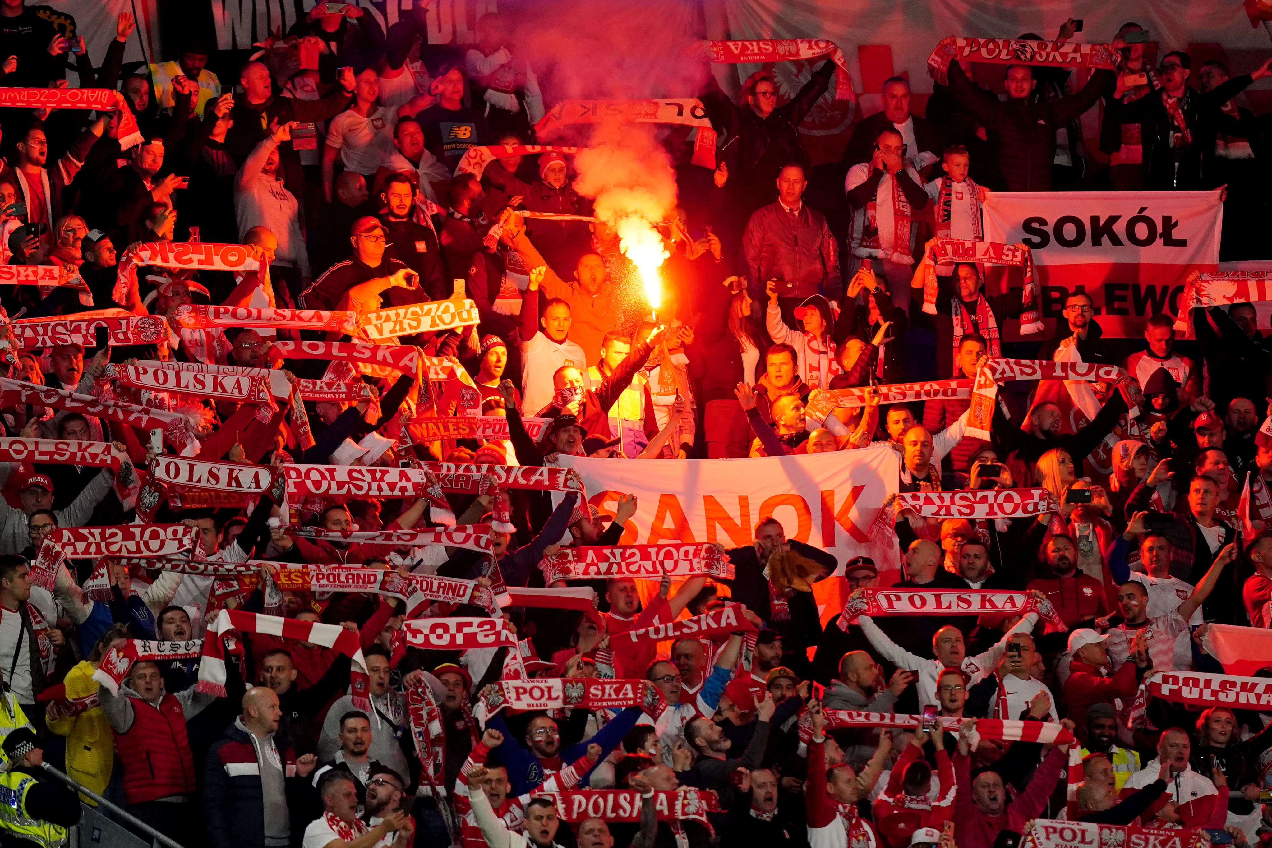 Poland fans set off flares in the stands at Cardiff City Stadium in September 2022 (Mike Egerton/PA)