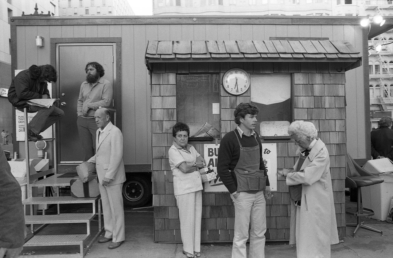 Waiting at an airport bus station in San Francisco, 1976