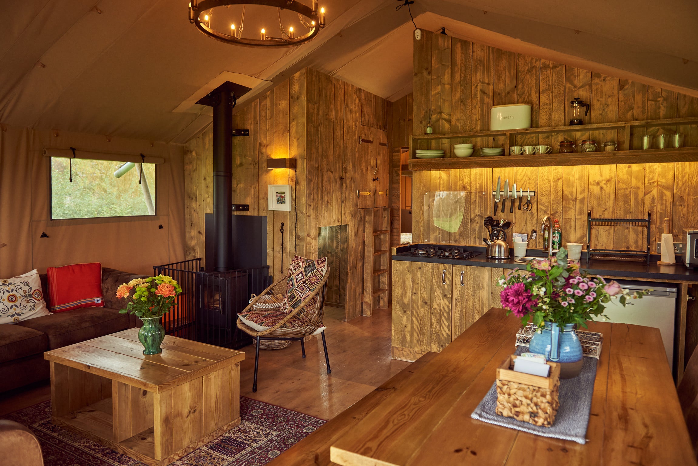 Luxury glamping lodges scatter the grounds of Double House Farm
