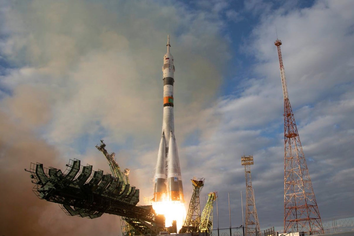 Russian Soyuz spacecraft with 3 astronauts docks at the International Space Station