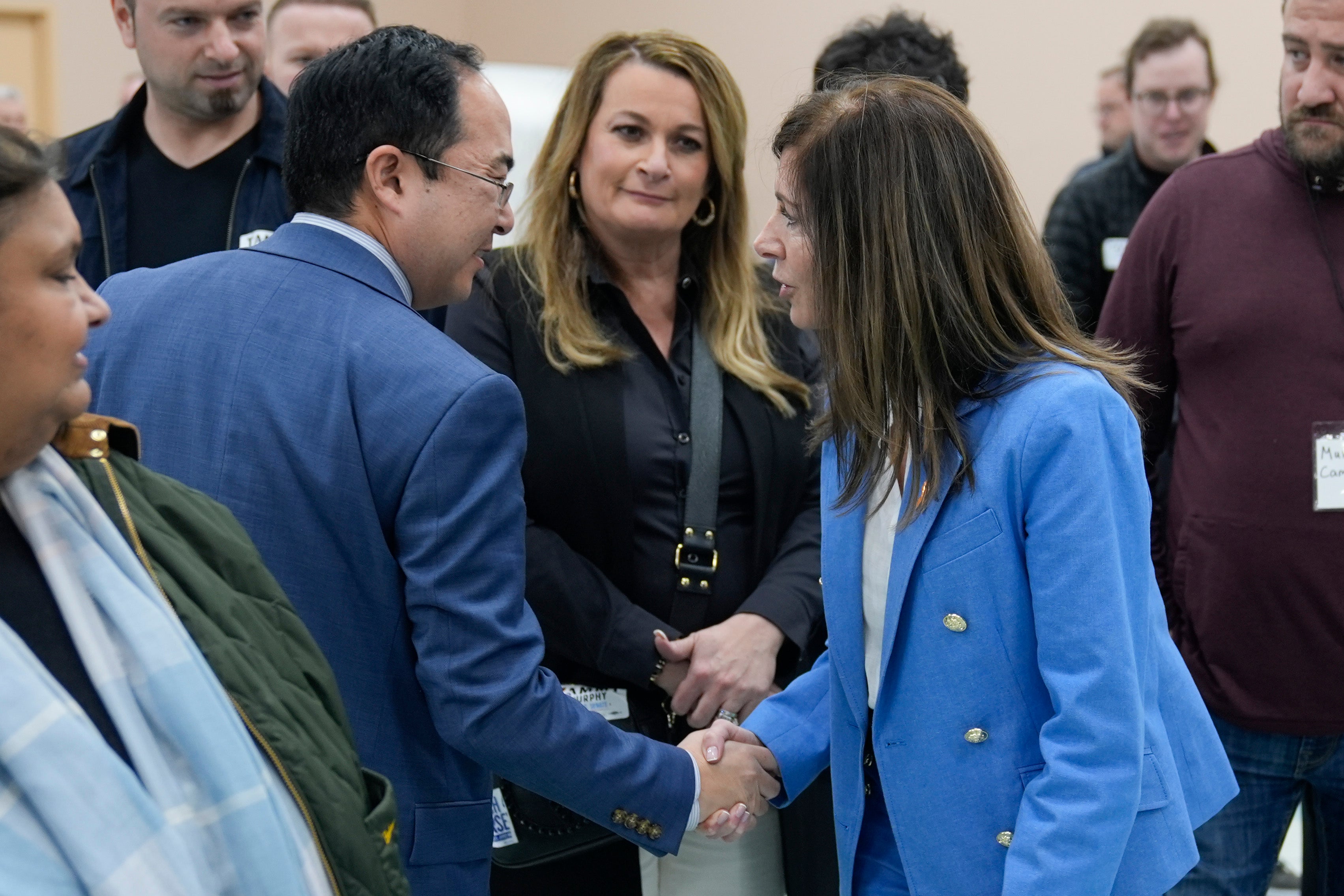 U.S. Senate candidate Rep. Andy Kim congratulates fellow candidate New Jersey first lady Tammy Murphy just before it was announced she defeated him at the Bergen County Democratic convention in Paramus, N.J., Monday, March 4, 2024