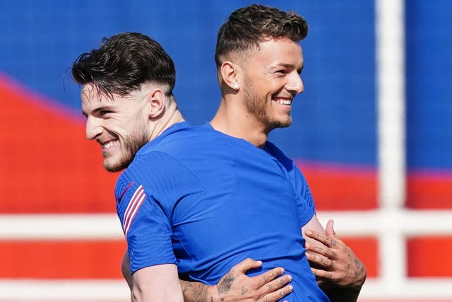 Declan Rice (left) hopes to convince Ben White (right) to make himself available for England (Martin Rickett/PA)
