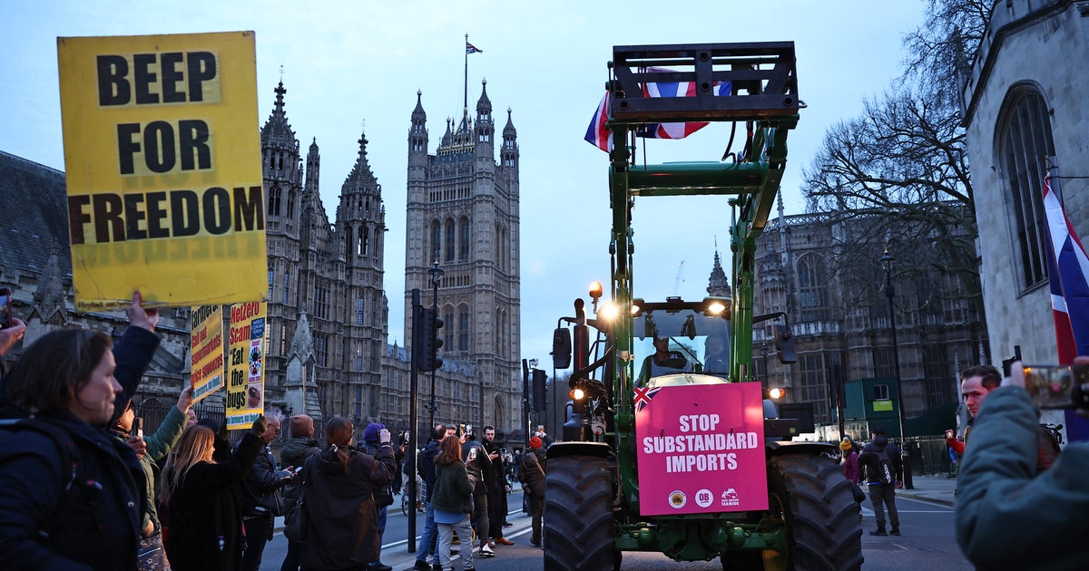 Farmers ride tractors into central London in major protest over trade deals | The Independent