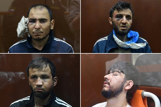 <p>The suspects, clockwise from top left: Murodali Rachabalizoda, Dalerdzhon Mirzoyev, Muhammadsobir Fayzov and Shamsidi Fariduni, appear in court</p>