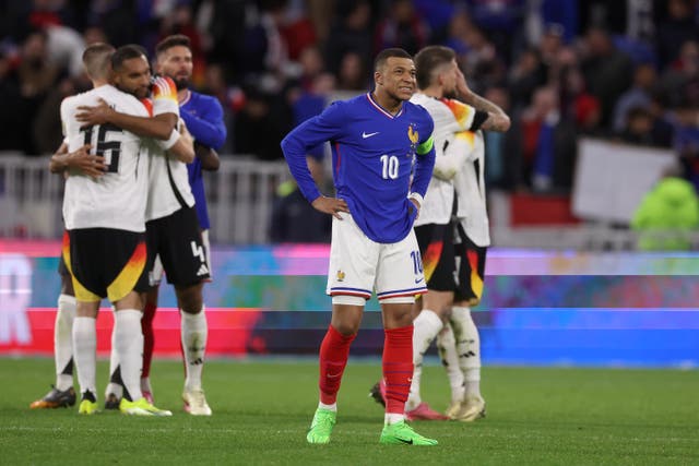 <p>Kylian Mbappe has urged France to improve ahead of Euro 2024 </p>