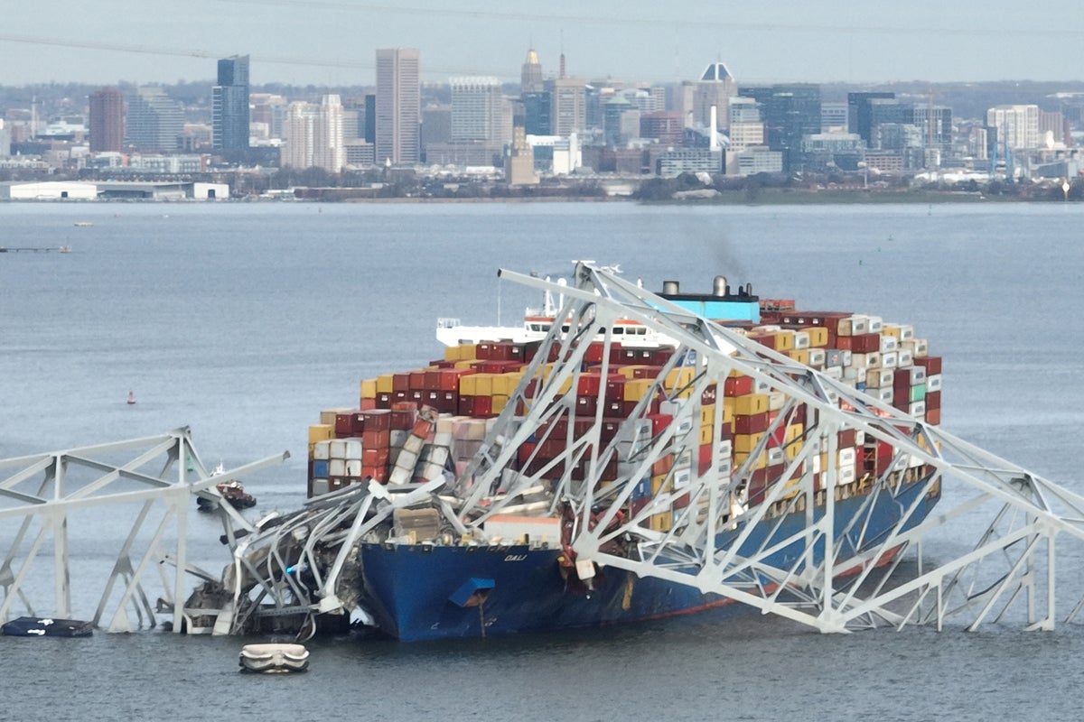 Biden pledges to rebuild Baltimore bridge destroyed by deadly container ship collision