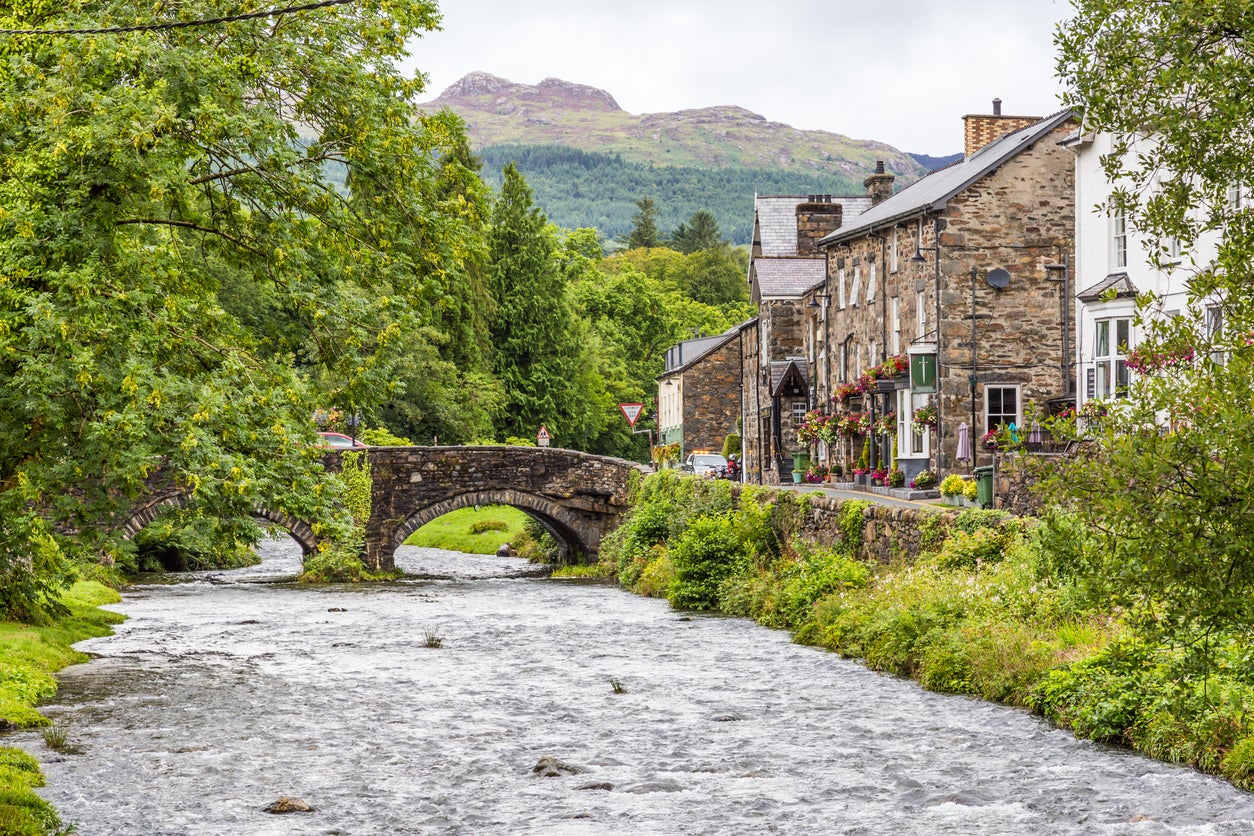 Find stone cottages under a mountain backdrop in North Wales