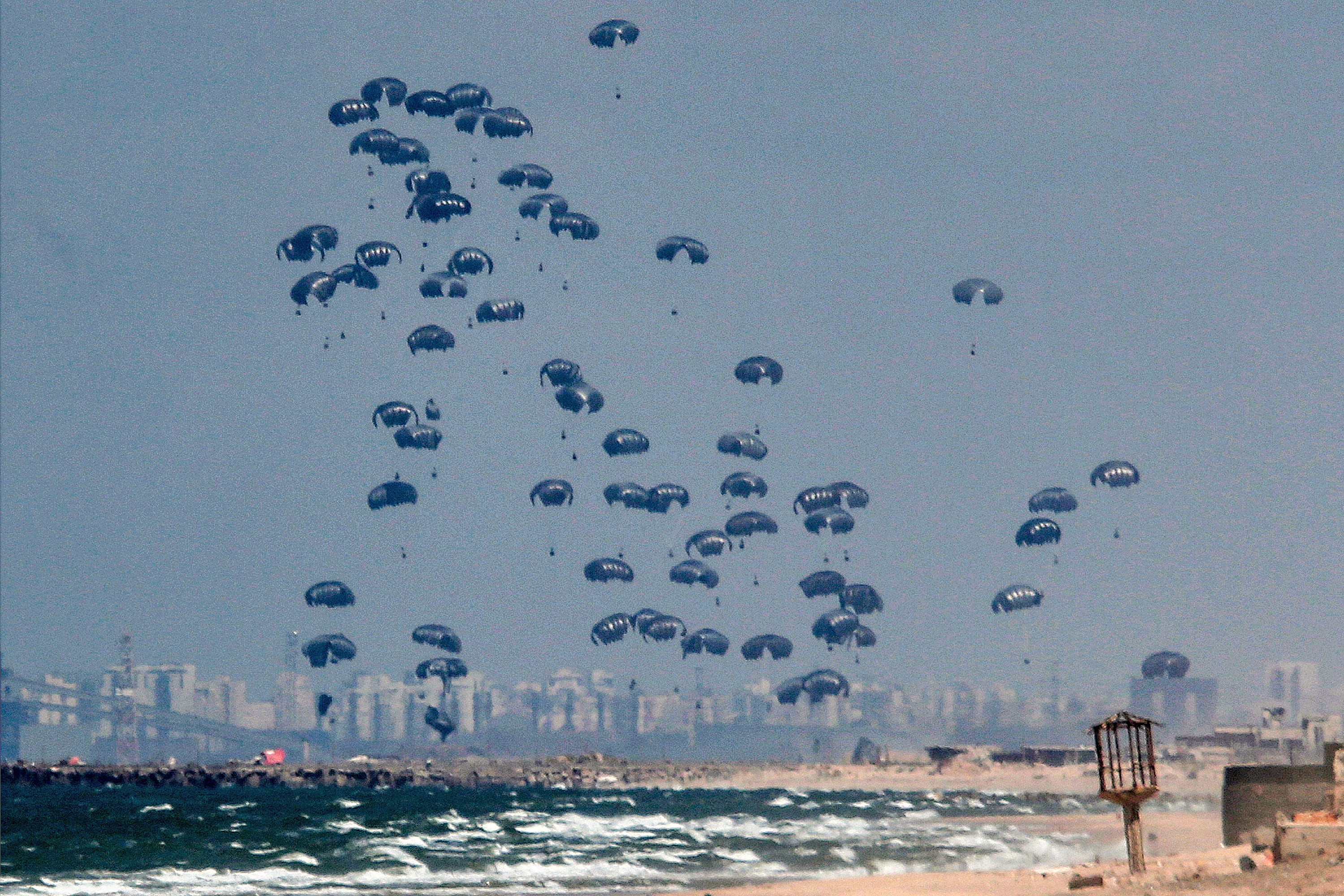 Humanitarian aid is dropped on the Gaza Strip, west of Gaza Cit