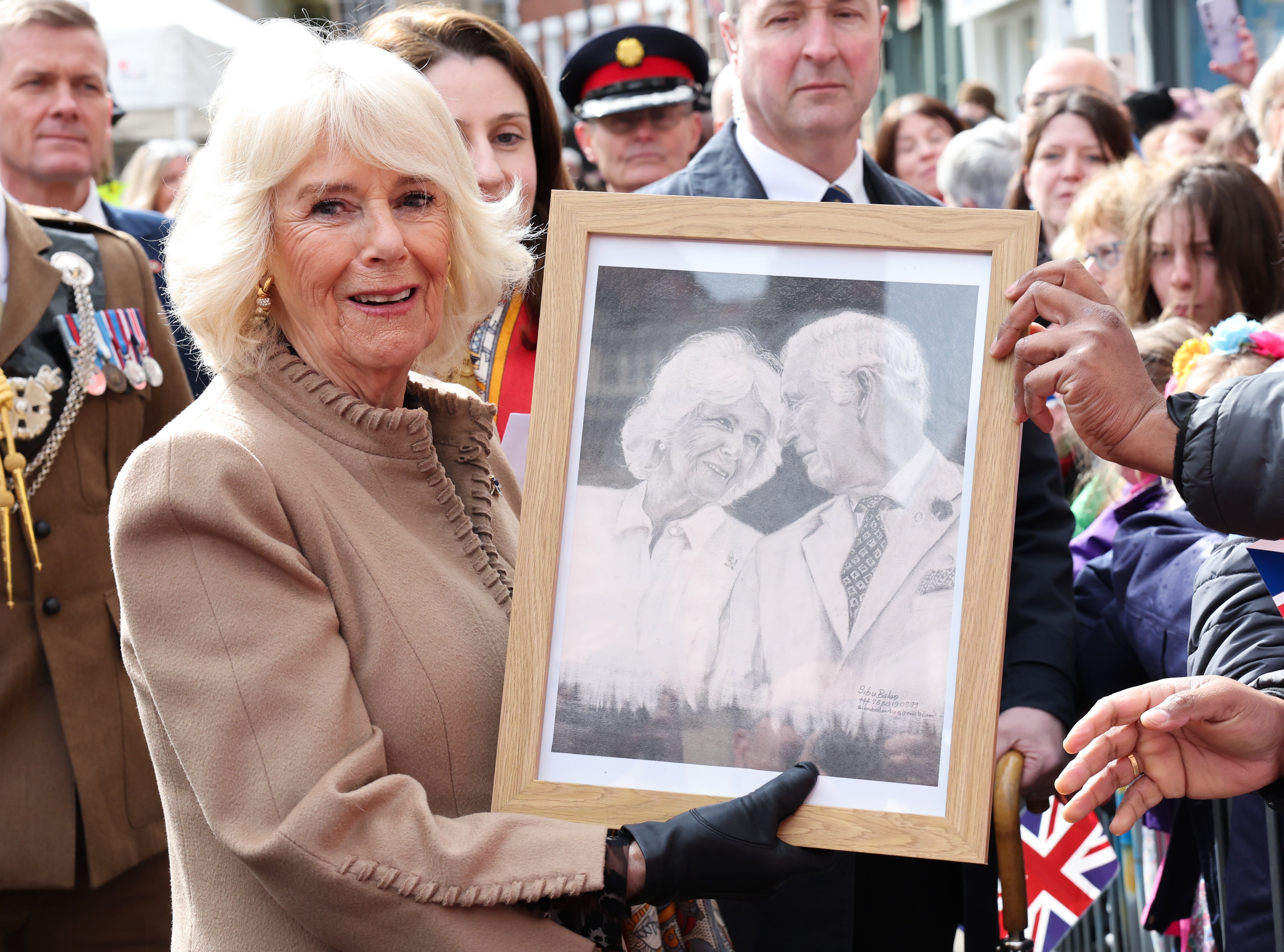 Queen Camilla receives artwork of herself and King Charles III – Charles is currently undergoing cancer treatment