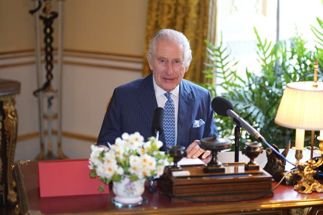 <p>Charles records his message in Buckingham Palace’s 18th Century Room</p>