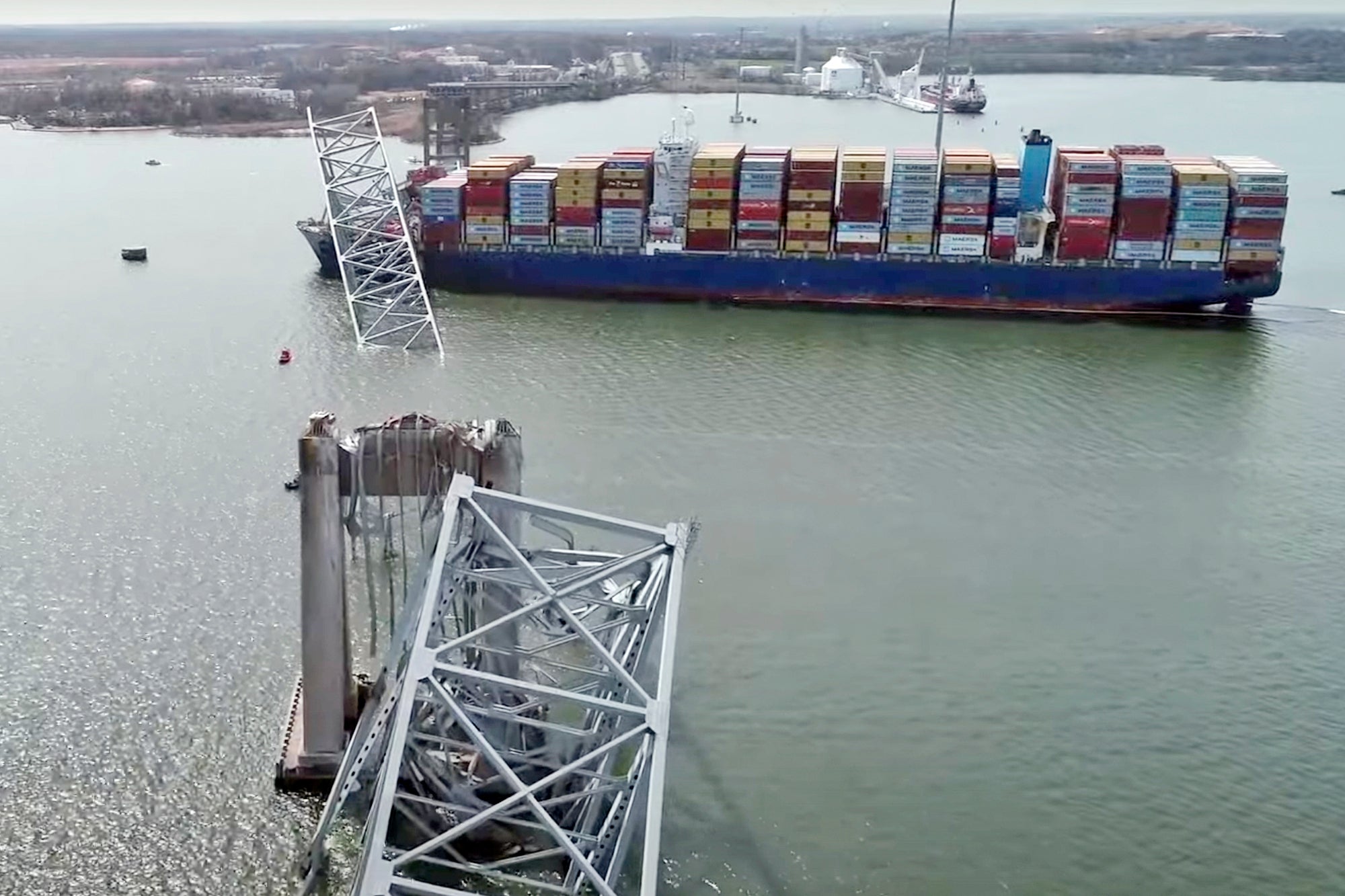 The collapsed bridge is seen in an aerial image