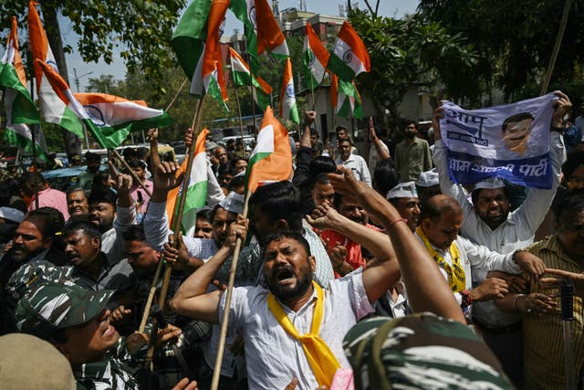 <p>Aam Aadmi Party (AAP) activists shout slogans during a protest near India’s prime minister Narendra Modi residence in New Delhi</p>