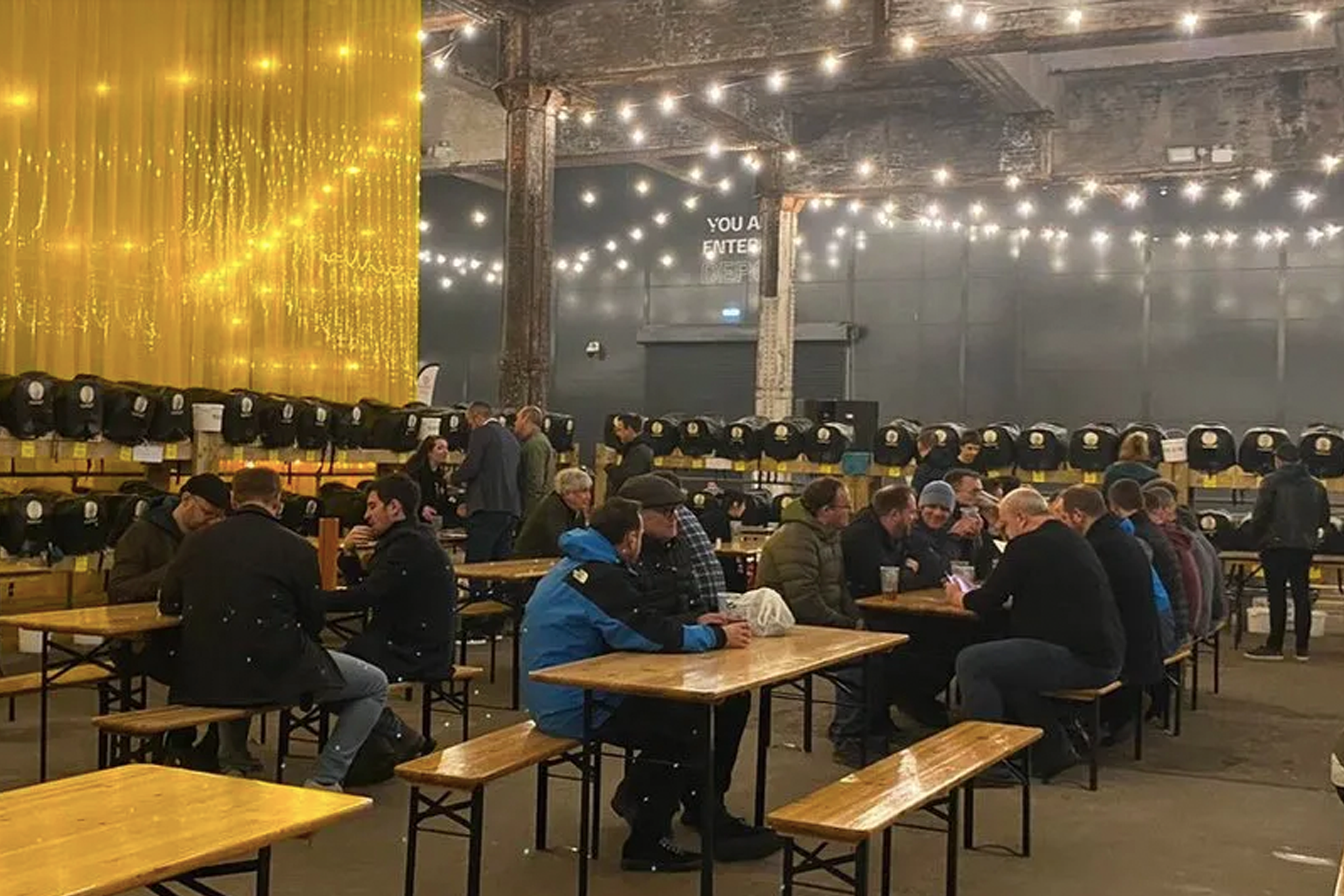 A Manchester beer festival was compared to Glasgow’s disastarous Willy Wonka experience after customers turned up to a ‘half empty’ venue with ‘rude’ staff