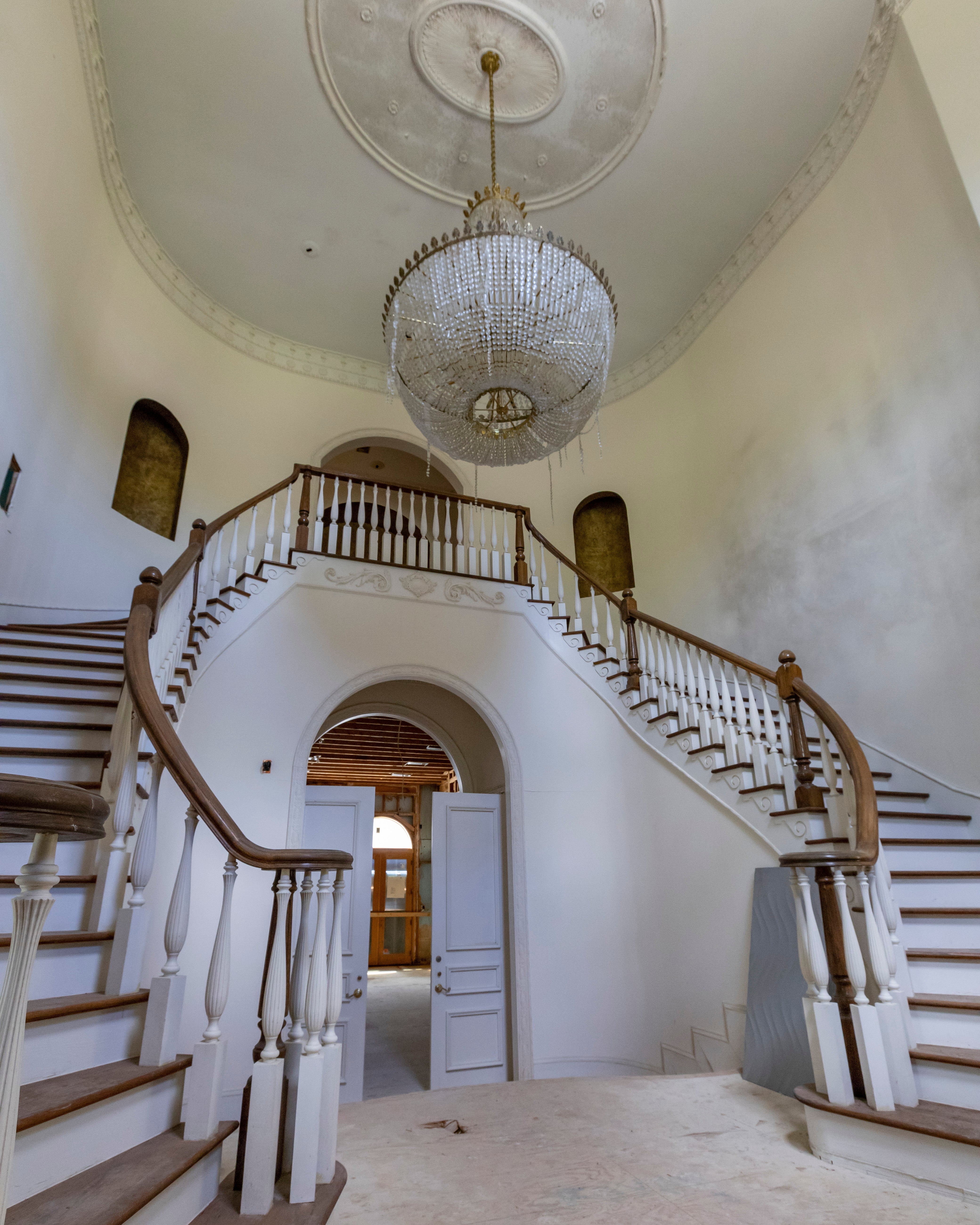 The grand staircase of Diddy’s abandoned mansion in Atlanta