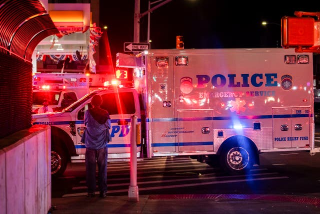 <p>A New York City Police Department ambulance carrying the remains of Officer Jonathan Diller drives out from under Jamaica Hospital Medical Center in New York, 25 March 2024</p>
