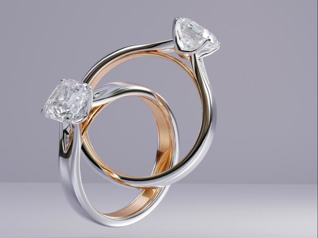 <p>Two engagement rings </p>