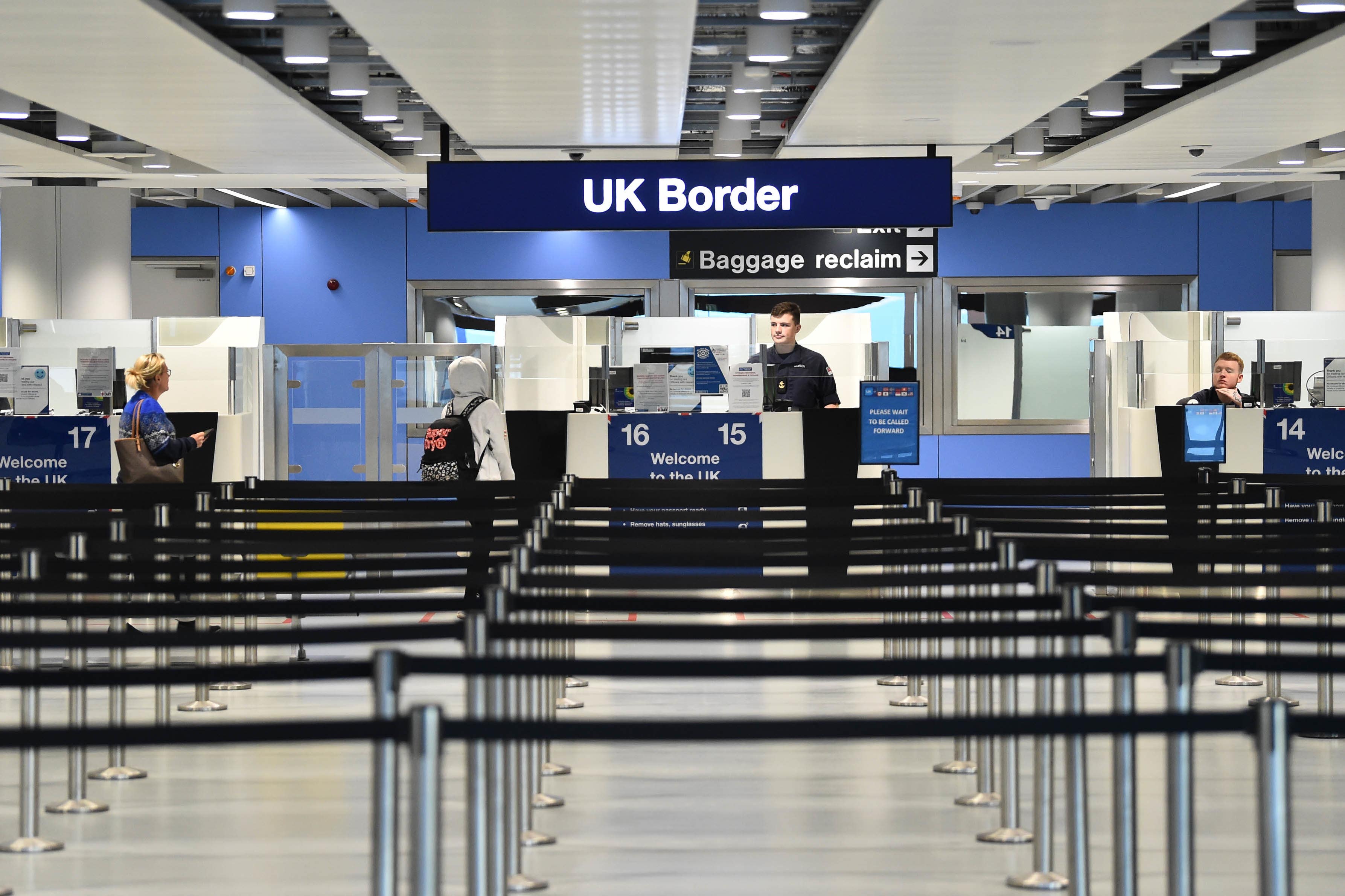 The workers carry out immigration controls and passport checks at Heathrow (PA)