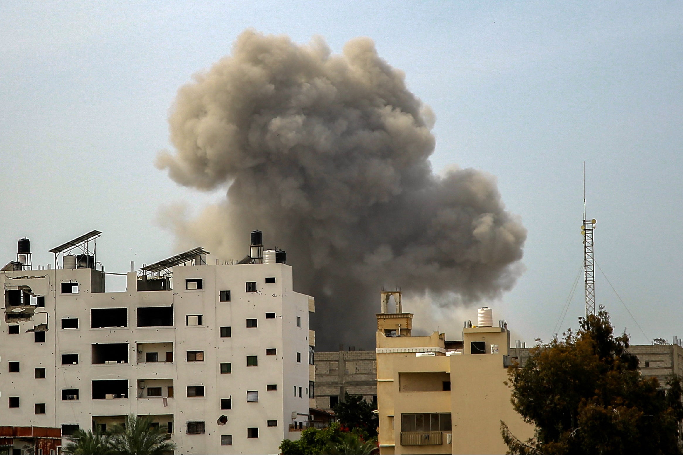 Smoke rises above buildings during an Israeli strike in the vicinity of the Al-Shifa hospital in Gaza City