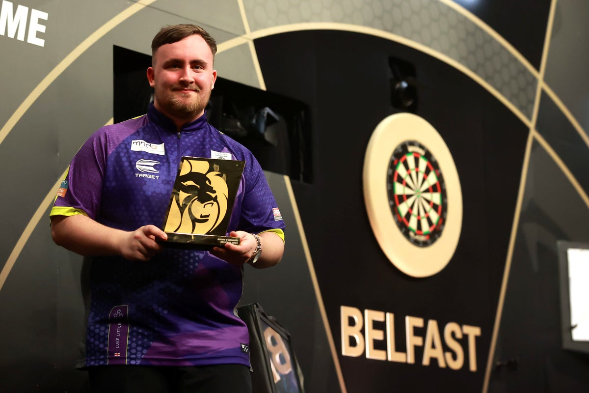 Luke Littler overcomes Nathan Aspinall to secure first Premier League win
