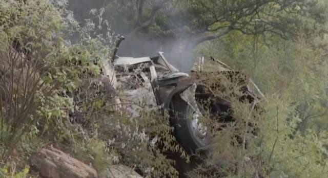 <p>A bus carrying worshippers headed to an Easter festival plunged off a bridge on a mountain pass and burst into flames in Limpopo, South Africa, on Thursday</p>