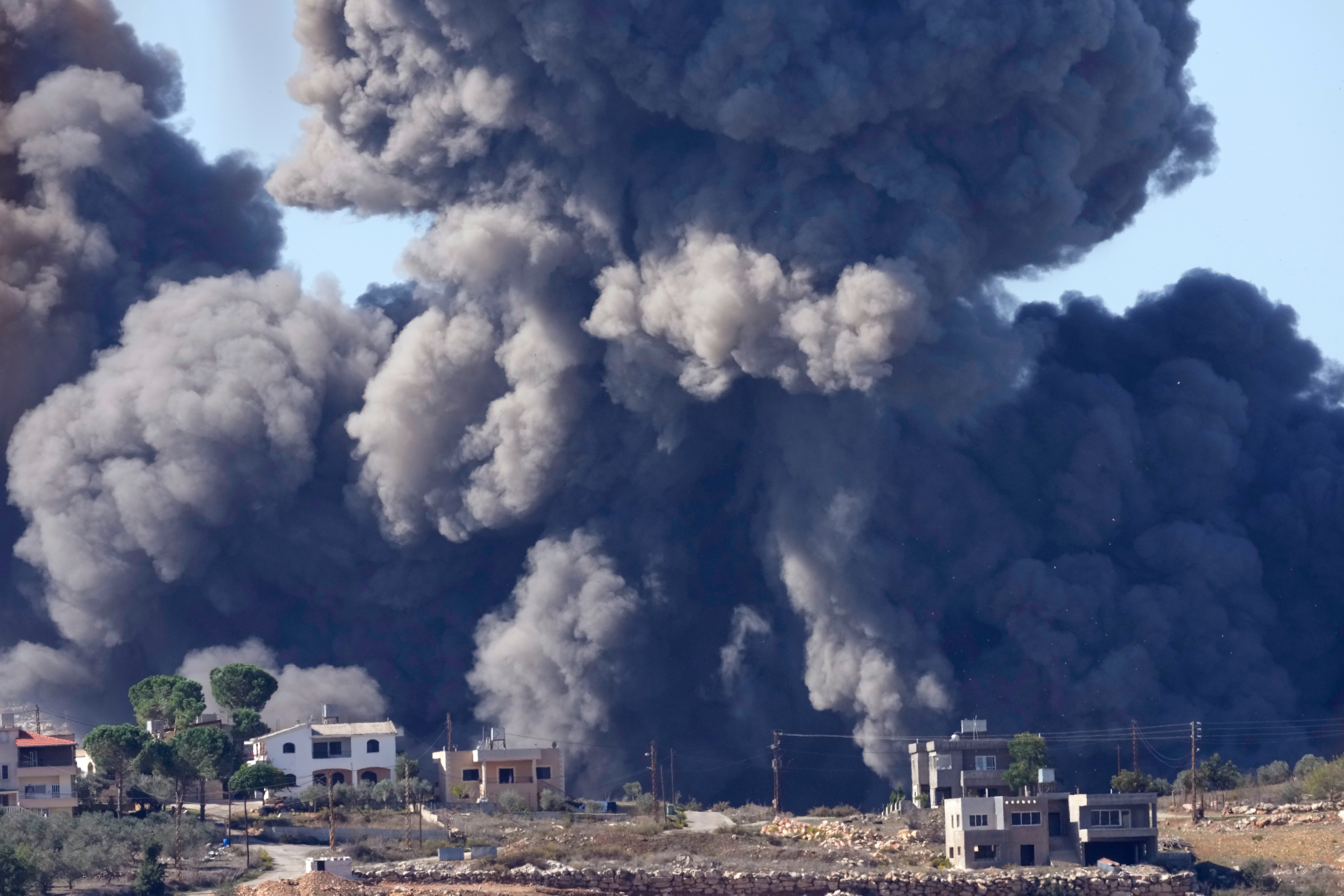 Black smoke rises from an Israeli airstrike on the outskirts of Aita al-Shaab, a Lebanese border village, on 4 November
