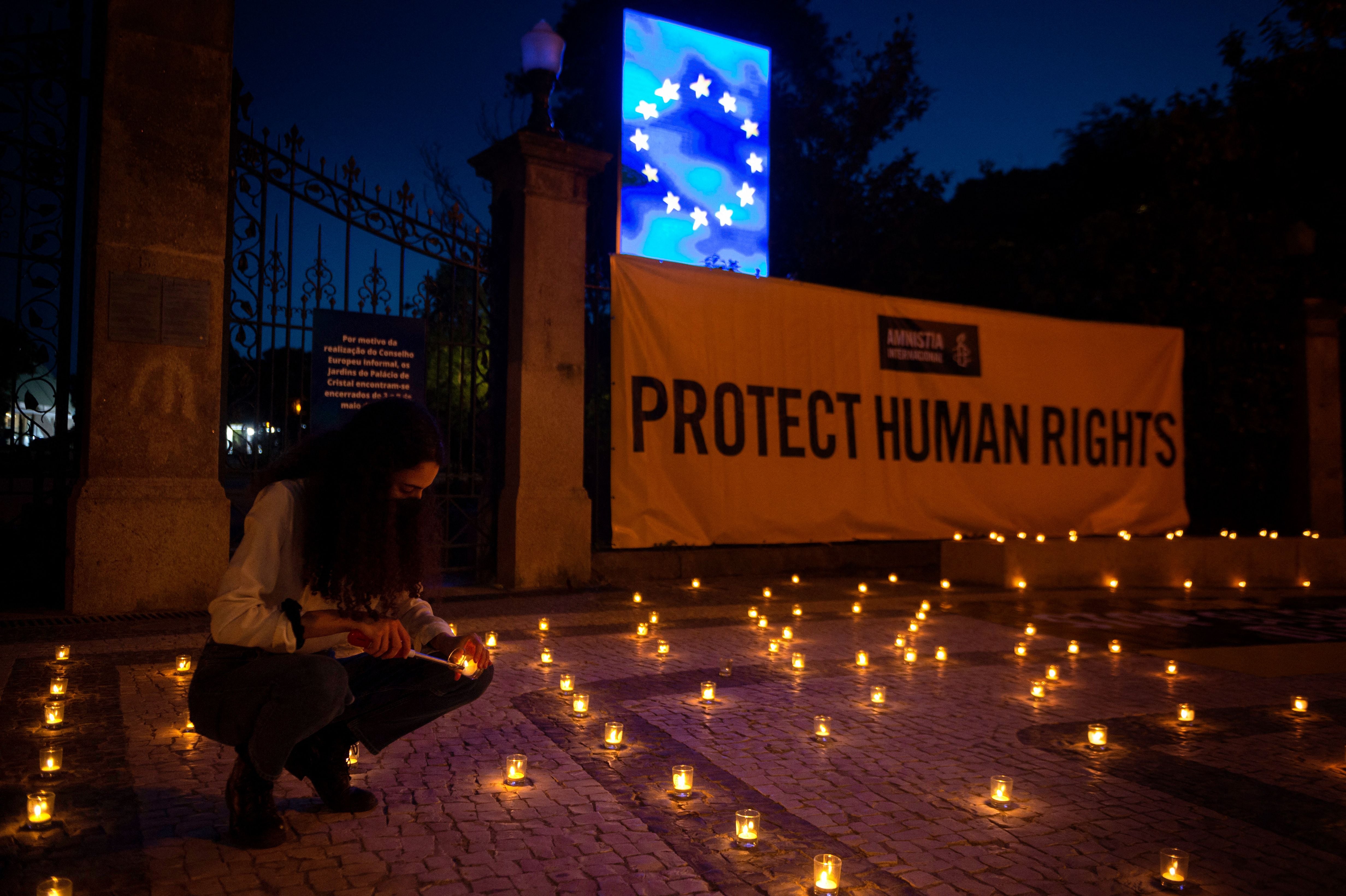 A 2021 vigil led by Amnesty International outside an EU summit in Porto demanding the protection of human rights in India during the Covid pandemic