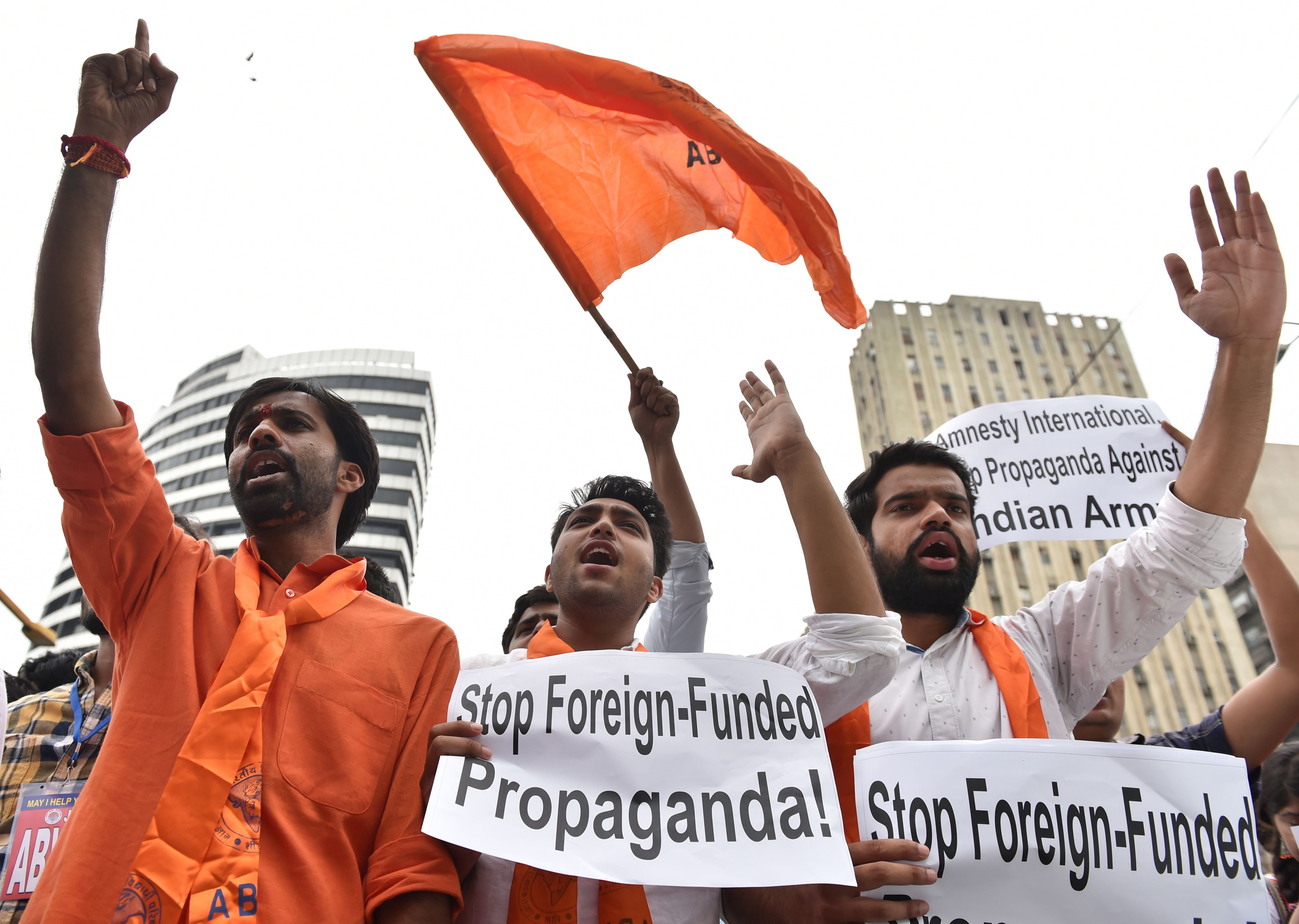 Hindu nationalist activists protest outside Amnesty’s New Delhi office in August 2016