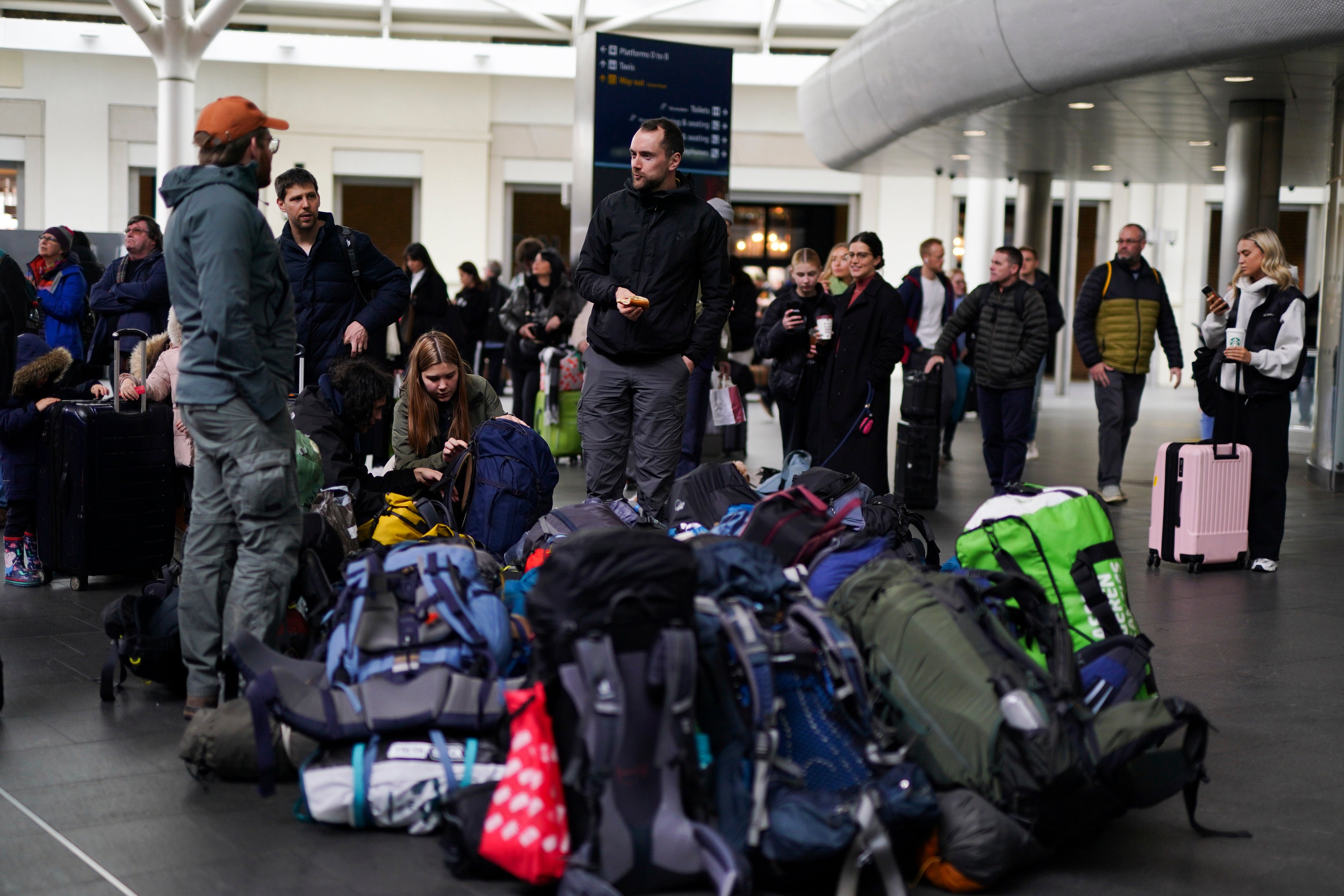 Passengers waiting for trains at London King's Cross Station as the getaway continues for the Easter weekend