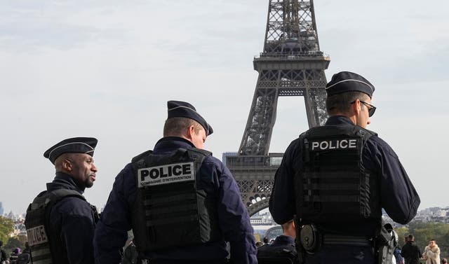 <p>Police officers patrol the Trocadero plaza near the Eiffel Tower in Paris </p>