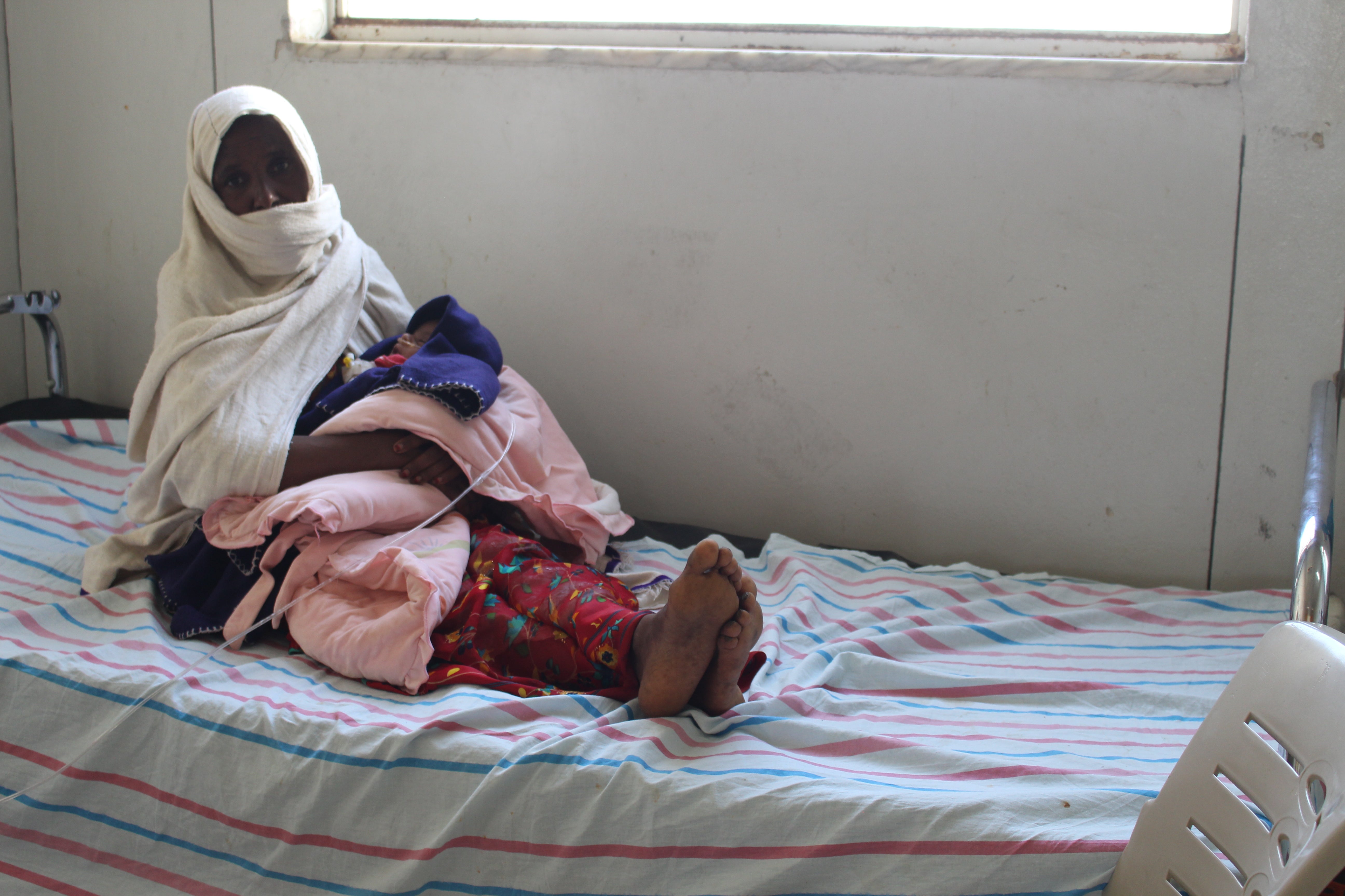 Mother and young infant in the Children’s Stabilisation Unit at Ayder Specialisation Hospital, Mekelle