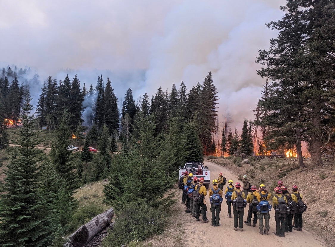 McLane briefs his crew on the plan ahead of an overnight burn operation in northern Washington in 2021